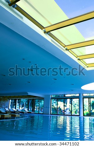 Blue sky through yellow ceiling in office center