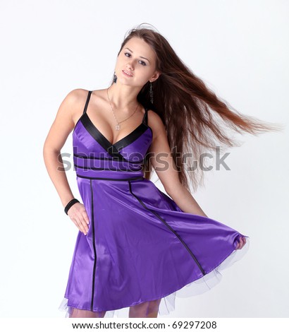 lovely dancing girl in violet dress