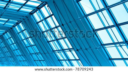 blue glass ceiling inside airport