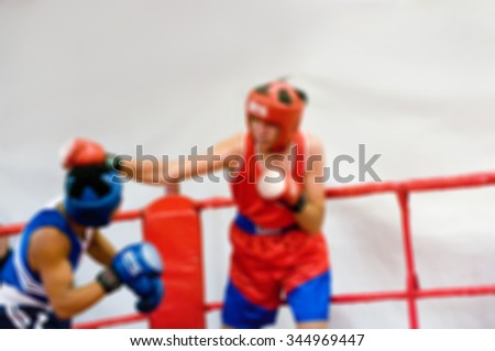 Blurred boxing fight. Abstract sports background with bokeh