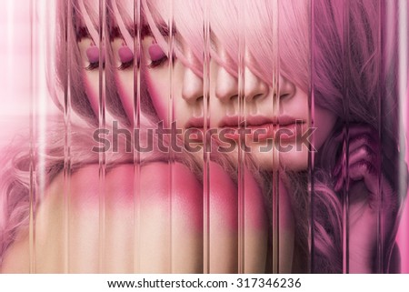 Closeup beauty portrait of attractive model face with bright pink visage