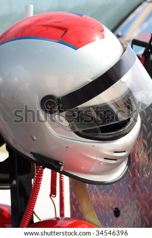 Motor-sports racing helmet. Waiting for the driver.