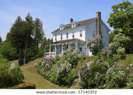 Victorian Era home and garden on a hill