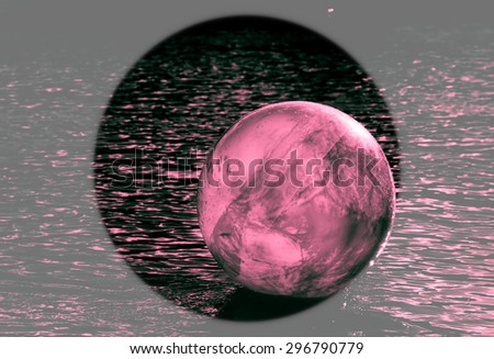 concept image for universal environmental issue using inflatable rubber ball with earth like markings and rippled water surface