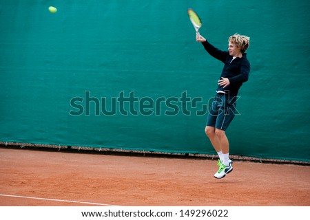 Tennis player before hitting the ball