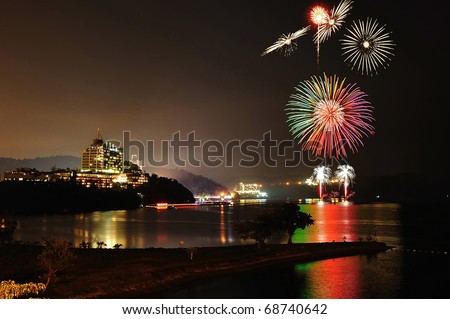 TAIWAN - DEC 31: Fireworks explode over Sun Moon Lake for New Years celebrations on Dec 31, 2010 in Taiwan.