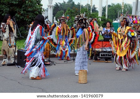 MOSCOW, RUSSIA -?? JUNE 8: Camuendo Wuambrakuna Indian folk dance and music group perfom outdoors at All-Russian Exhibition Center June 8, 2013 Moscow, Russia.