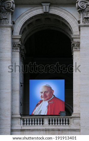 ROME, VATICAN - APRIL 30, 2014: Portrait of Pope John Paul II on the Papal Archbasilica of St. John Lateran (Arcibasilica Papale di San Giovanni in Laterano) canonized on April 27, 2014