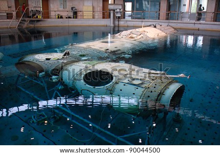 STAR CITY, RUSSIA - AUGUST 21: Russian segment mockup of International Space Station descends on the platform at Russian Hydrolab Water Immersion Facility August 21, 2009 in Star City, Russia