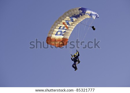 MIDLAND, MICHIGAN-SEPTEMBER 17:Sky diver glides into Midland Fairgrounds during balloon festival exhibition in Midland, MI on September 17, 2011.