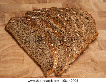 Soda Bread sliced on a wooden bread board