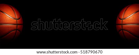 Basketball on a black background. panoramic background or with blank space