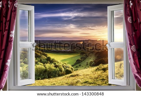 View through an open window onto beautiful landscape