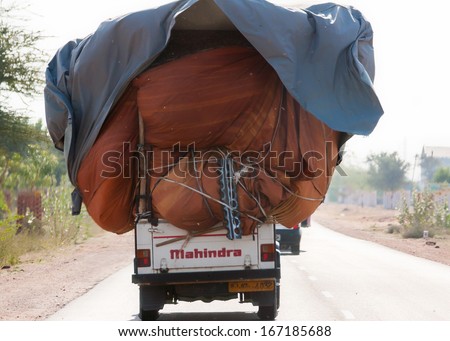 Rajasthan, India - Circa February 2011: Common Practice Of Loading A Pickup Truck To The Max And Driving It On The Road.