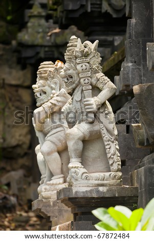 Stone carving of god in Goa Lawah. Bali. Indonesia