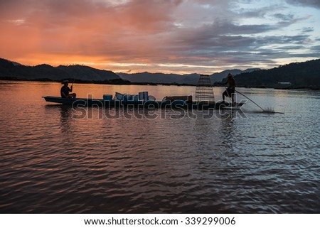 Nong Khai Province, Thailand - November 8: Fishermen use fishing boat to catch fish on the lake on November 8, 2015, in Nong Khai Province, Thailand.