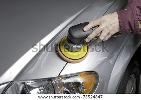 A liquid cleaner is applied to the car finish to remove any grease,road tar and old wax prior to final waxing.