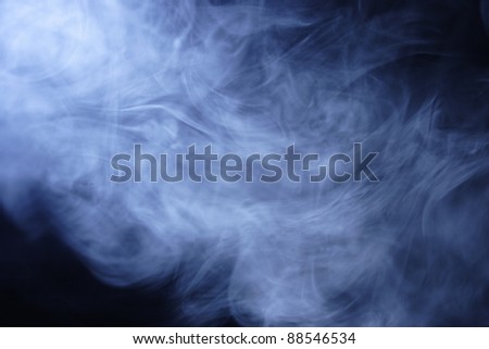 Clouds of blue cigarette smoke second hand smoke from a cigarette