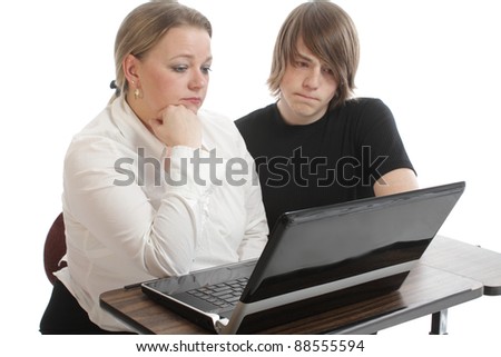 Teenager helps women with computer