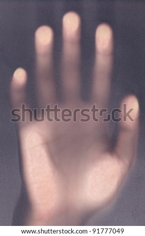 scary palm of hand behind shower curtain background