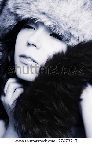 russian fashion girl in white and black furs