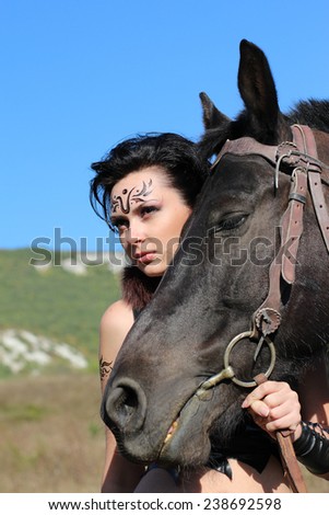 girl-warrior - Amazon with a black horse