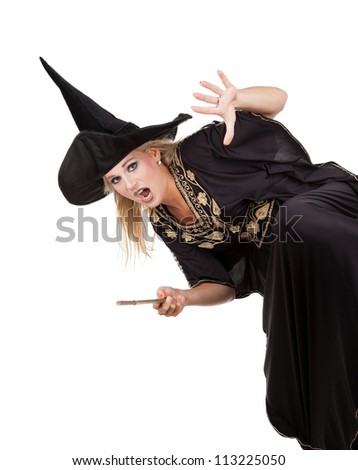 Scary sorceress casting a spell. isolated on white background