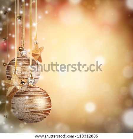 Christmas theme with golden glass balls and free space for text