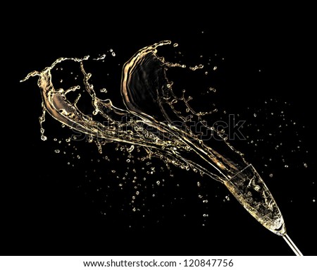 Celebration theme with splashing champagne, isolated on black background