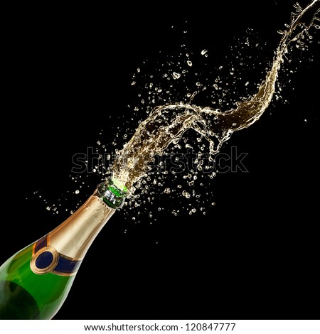 Celebration Theme With Splashing Champagne, Isolated On Black Background