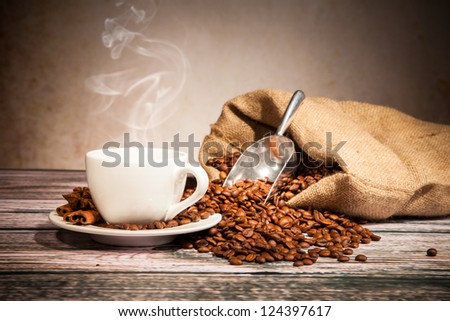 Coffee still life with wooden grinder