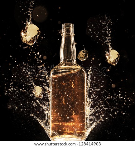 Concept of liquor splashing around bottle, isolated on black background