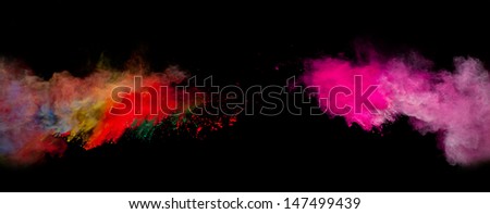 Colored powder isolated on black background