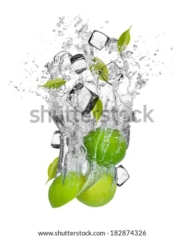 Falling pieces of limes in water splash and ice cubes, isolated on white background