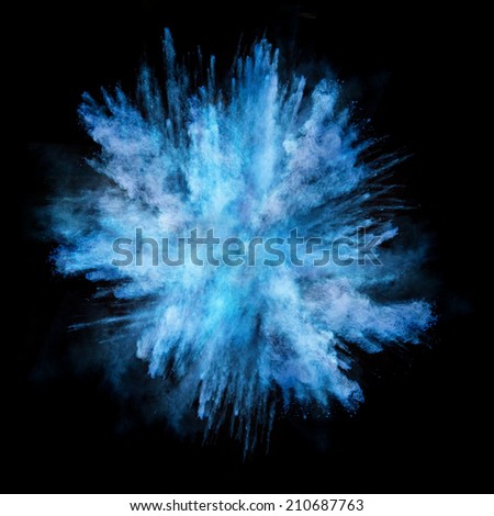 Freeze motion of blue dust explosion isolated on black background