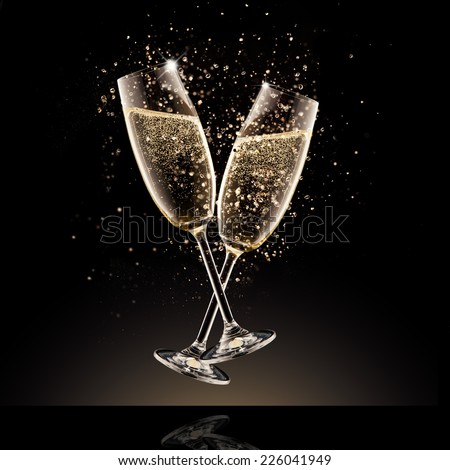 Celebration theme. Glasses of champagne with bubbles, isolated on black background