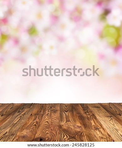 Spring abstract background with wooden planks and blurry background