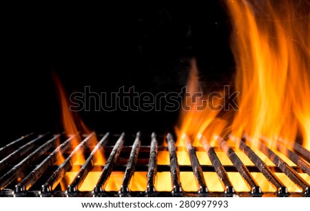 Empty grill grid with fire flames, isolated on black background