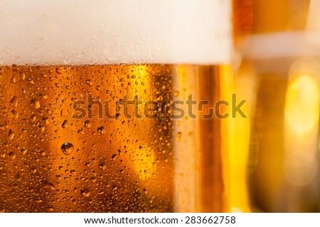 Close-up of jug of beer placed on bar counter