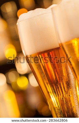 Close-up of jug of beer placed on bar counter