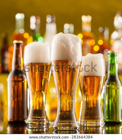 Jugs of beer placed on bar counter