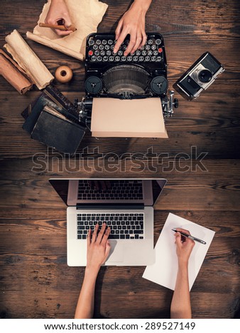 Old typewriter with laptop, concept of technology progress