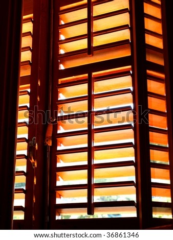 Wooden window with sunshine