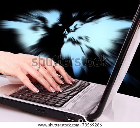 Woman hand typing on laptop