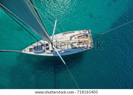 View from high angle of sailing boat. Aerial photography of ship deck, shot from main spar.