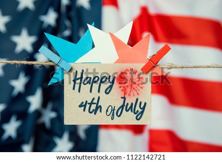 Happy fourth of july against usa flag. Happy independence day card