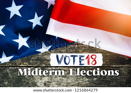 november VOTE, Flag of the USA on patriotic background. toned abstract Photo