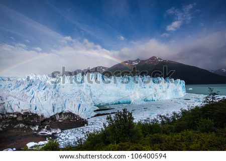 Rainbow covers the Moreno glacier in Patagonia, Southern Chile
