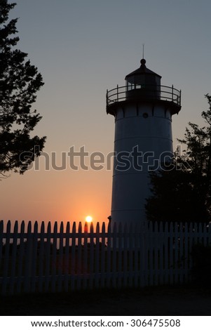Sunrise by lighthouse near Vineyard Haven, MA