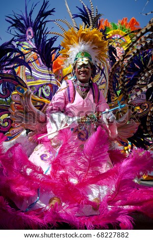 NASSAU, THE BAHAMAS - JANUARY 1 - Female troop leader dances in Junkanoo, a cultural festival on Jan 1, 2011 in Nassau